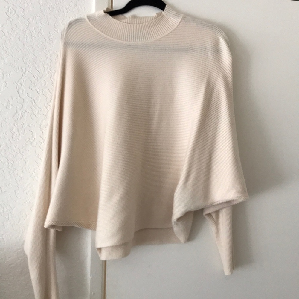 Cream sweater